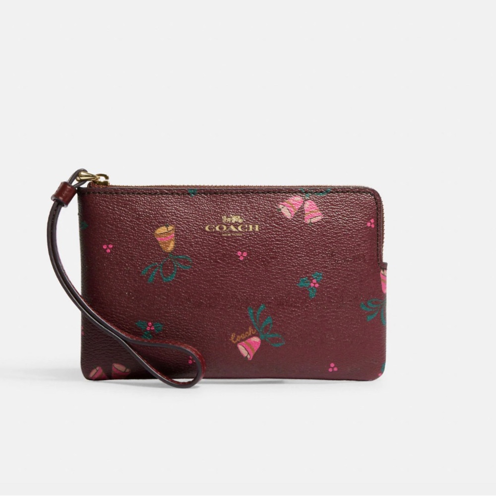 🍒COACH- Brand New Corner Zip Wristlet with Holiday Bells Print